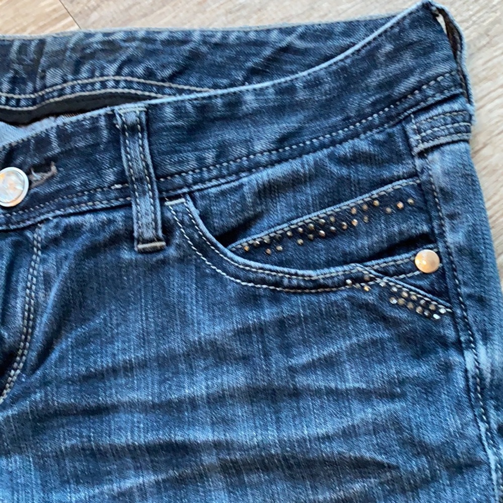 Express Mid Rise Darker Wash Skinny Jeans - Picture 4 of 11